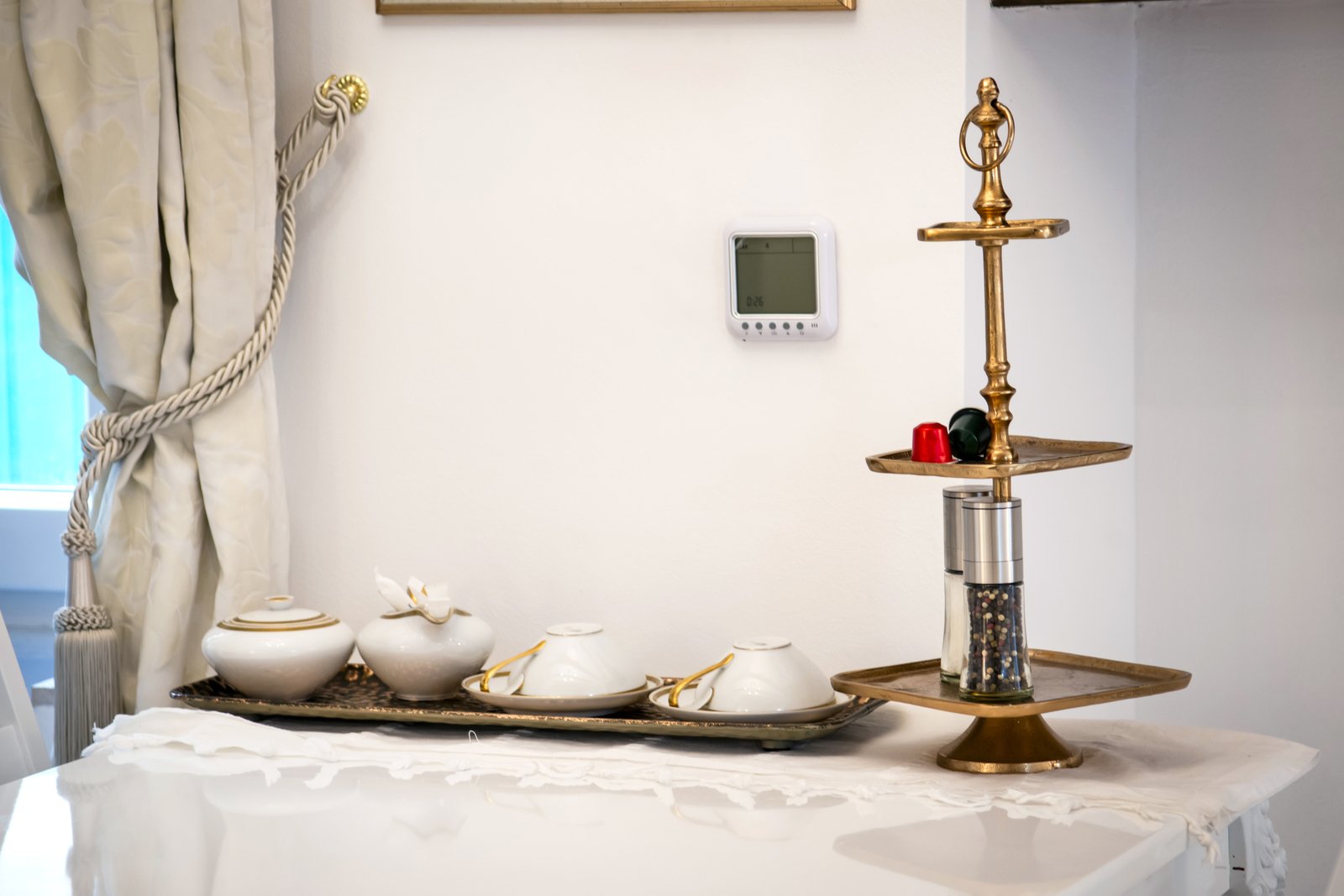 A welcome tea set laid out on a brass tray